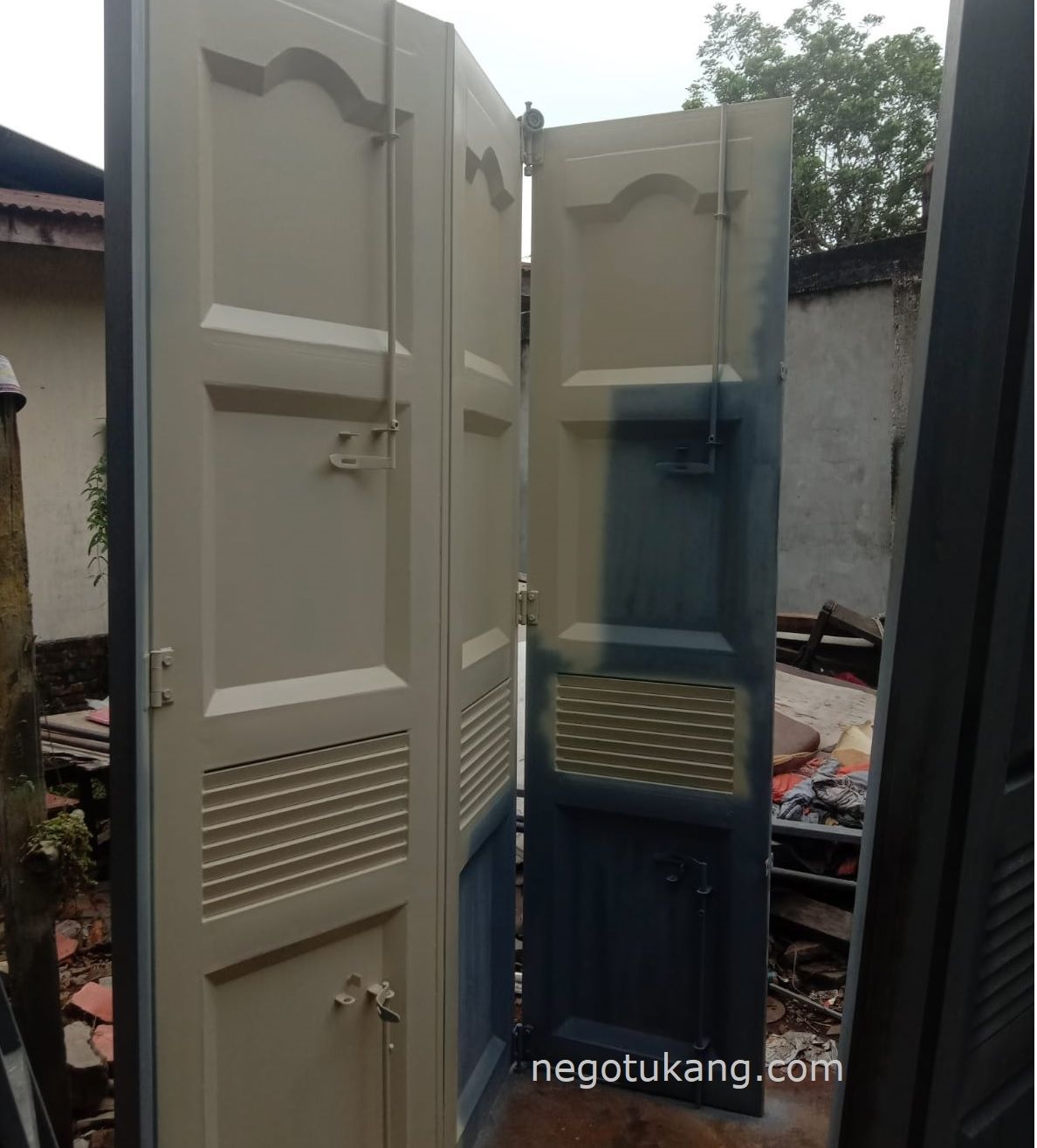 jasa tukang NegoTukang.Com - Jasa Pembuatan Pintu Ruko No 1. Ketebalan Plat Besi 2 mm 